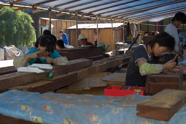 Wood Carvers engaged in restoration